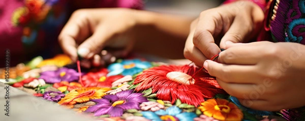 Obraz Traditional hand embroidery in vibrant colors crafted by skilled artisans in a lively market setting