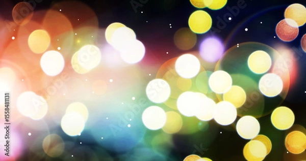 Fototapeta Abstract view of beautiful and colorful holiday winter of outdoor blurry bokeh light with small soft snow.
