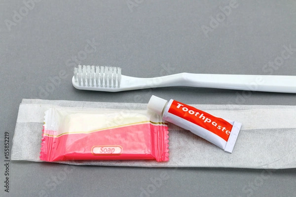 Obraz Hotel amenities kit on gray background