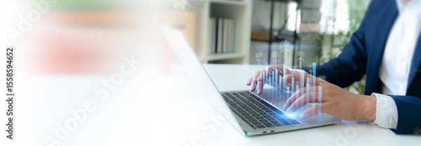 Obraz AI Driven Customer  Analytics Concept. Hands typing on a laptop with a digital overlay of interconnected data analysis and artificial intelligence icons, representing an AI powered customer insights.