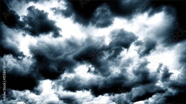 Obraz Dramatic storm clouds in deep blue, a sweeping skyscape with dynamic light, nature's raw power on display