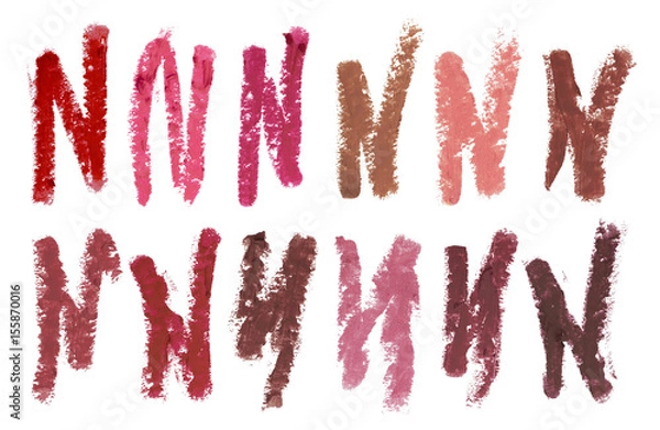 Fototapeta Color stroke samples of different colors and shapes of lips contour cosmetic pencils, beauty products isolated on white background