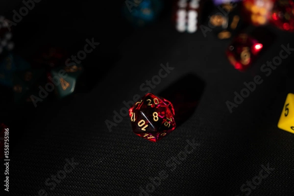 Obraz Dramatically Lit Translucent Red D20 Die