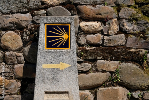 Fototapeta Sign with the symbol of the Camino de Santiago pilgrimage path in Galicia