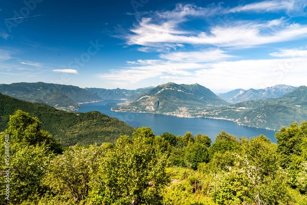 Fototapeta Panorama of Lake Como, with Tremezzina, Villa Balbianello, a glimpse of Lake Lugano, photographed from Alpe Tedoldo.
