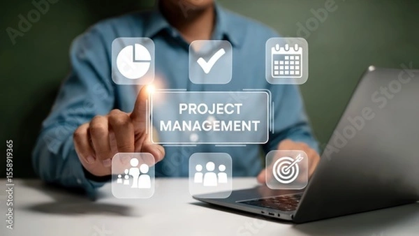 Obraz Person working on project management tasks on a laptop