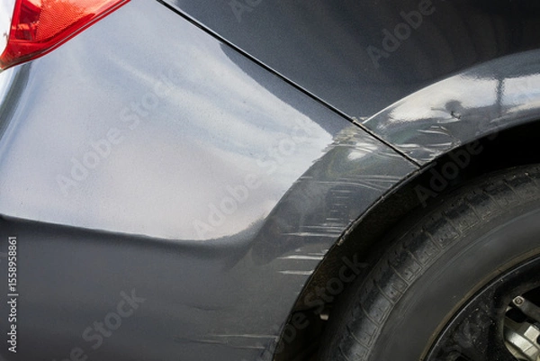 Obraz Scratched car fender damage close-up