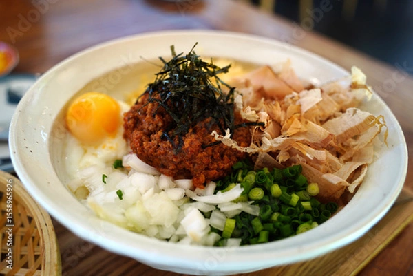Obraz Delicious Japanese Mazesoba Udon Noodles with Egg and Toppings – Close-Up View