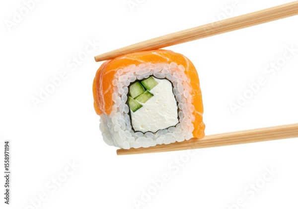 Obraz Fresh Philadelphia sushi roll with white rice, green cucumber, cream cheese, orange salmon, held by brown wooden chopsticks, suspended against a stark white background with copy space, commercial