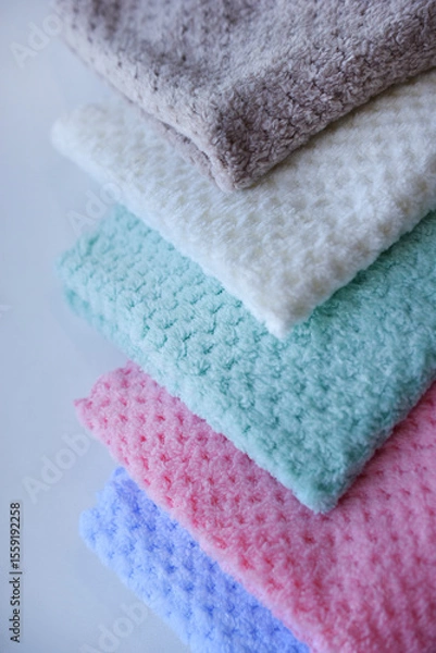 Fototapeta Multi-colored pile towels. A soft towel.
