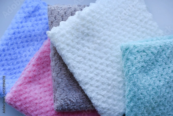 Fototapeta Multi-colored pile towels. A soft towel.
