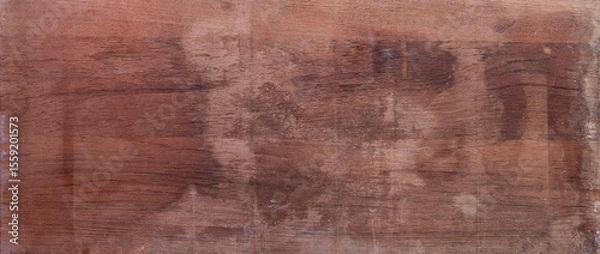 Fototapeta Aged mahogany wood surface with natural texture and weathered appearance