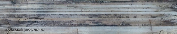 Fototapeta Aged plastic sheet texture with worn surface and visible details