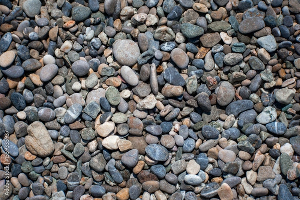 Fototapeta pebbles on beach and background