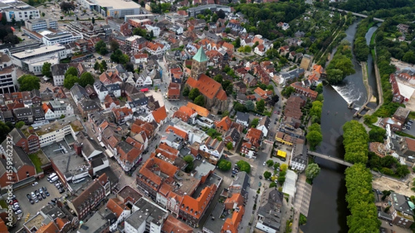 Fototapeta Aerial view of the old town of the city Rheine in Germany on an overcast day in afternoon
