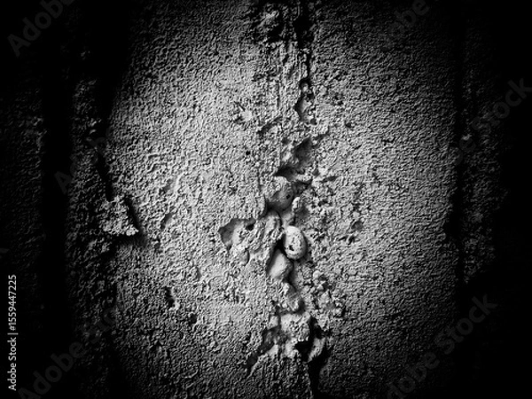 Fototapeta Abstract scratch grunge concrete wall texture. Use as a background or wallpaper. Black and white, so contrast and grainy