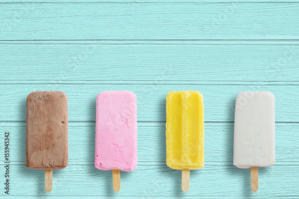 Fototapeta Ice cream stick put on wood background with copy space.