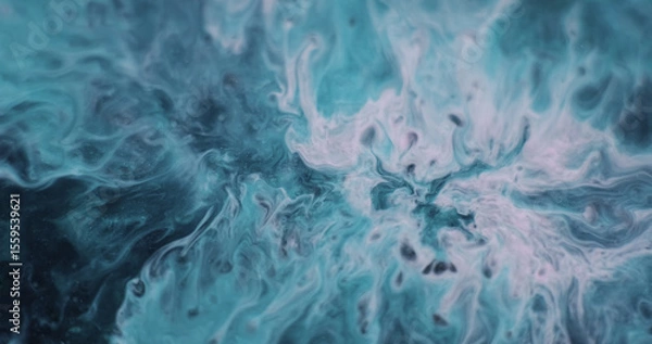 Fototapeta Blend ink. Abstract stains. Defocused blue purple color stream water liquid drip shiny particles spreading on art dark black background.