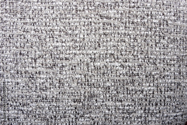 Obraz close-up shot of a tightly woven fabric with a mix of light gray and darker threads