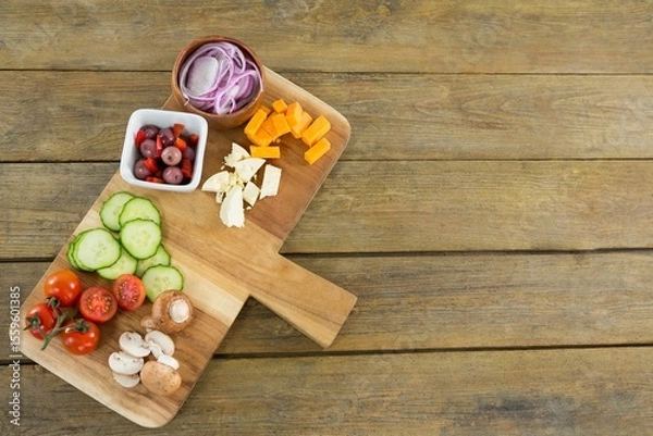 Obraz Chopped vegetables on cutting board