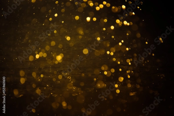 Obraz Blurred photo with golden dots visible glittering, shining brightly look and feel luxurious Suitable for use as a wallpaper