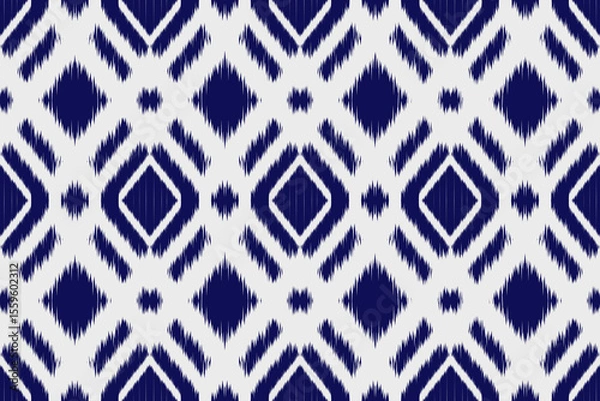 Obraz White and blue Abstract geometric Ikat pattern seamless.