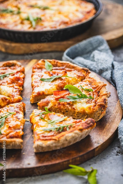 Obraz Fresh homemade Italian pizza with ham and buffalo mozzarella