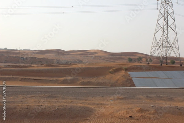Fototapeta Dubai desert safari in sunset light. Off road safari in sand desert, Empty Quarter Desert in United Arab Emirates. Off roader on dunes in Rub al Khali desert.