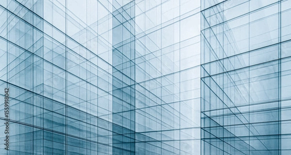 Fototapeta Modern glass office facades overlap creating abstract geometric pattern of transparent blue grids lines shapes corporate background banner concept