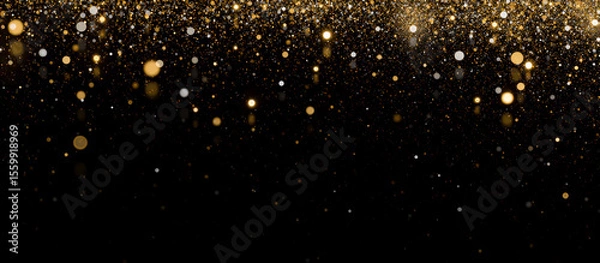 Fototapeta Golden glitter overlay on black background with glowing particles, shimmering bokeh, light sparkles, festive decoration, dust effect, luxury design, celebration atmosphere.