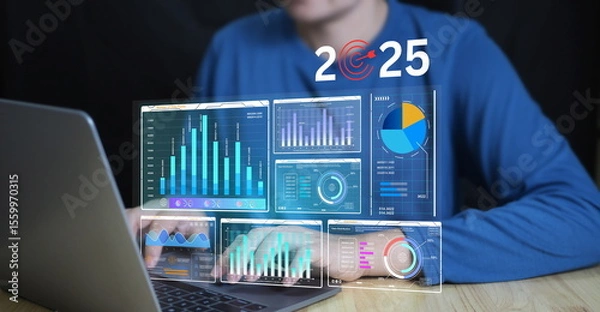 Fototapeta A businessman analyzes 2025 market growth trends using KPI dashboards, charts, and AI tools to plan business strategy, e-commerce growth, and financial performance.