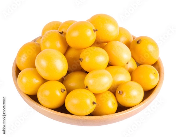 Fototapeta Vibrant yellow passion fruits overflow from a rustic wooden bowl, highlighting their fresh tropical essence.