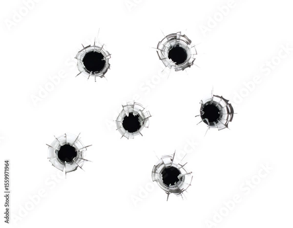 Fototapeta Six impactful bullet holes shatter clear glass, creating a powerful visual of damage and force.