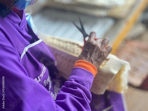 Obraz hands of a girl playing with a thread