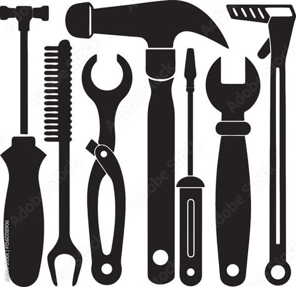 Fototapeta Collection of silhouetted hand tools including a hammer and wrenches