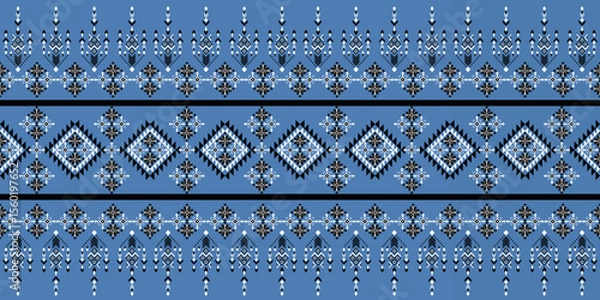Fototapeta Geometric ethnic seamless pattern blue and black  design for carpet,curtain,clothing,fabric,wrapping paper,tiles,textiles,batik,texture and wallpaper.Vector background.