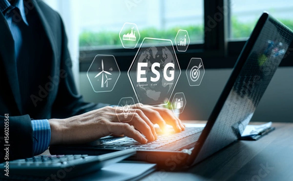 Obraz ESG environment social governance investment concept. Businessman using computer to analyze investment ESG. strategy that considers the environmental, company carbon labor practices, sustainability