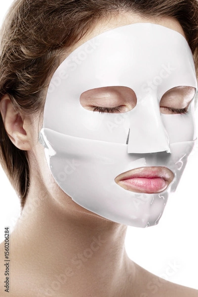 Obraz Woman Using Bio-Collagen Deep Hydration Sheet Mask for Skin Brightening and Firming