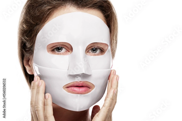 Obraz Woman Using Bio-Collagen Deep Hydration Sheet Mask for Skin Brightening and Firming