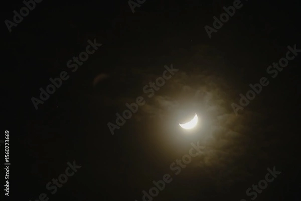 Obraz half moon covering by cloud floating on sky in night background