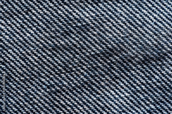Fototapeta Stitched & Strong: A Detailed Look at Denim’s Unique Texture