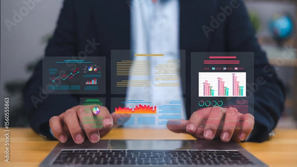 Obraz Businessman interacting with a futuristic virtual data analytics dashboard on a laptop, Key performance indicators, charts, business reports for strategic planning, decision making, growth insights.