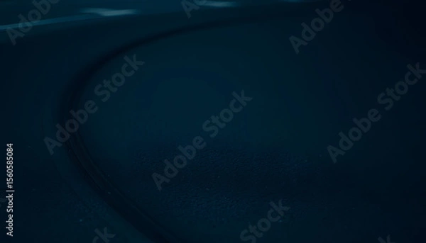 Obraz Abstract transportation background with turning black tire tracks over dark asphalt road pavement, Diffused lighting. White tone