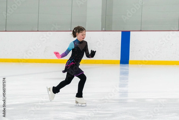 Obraz Figure skating practice at an indoor skating rink