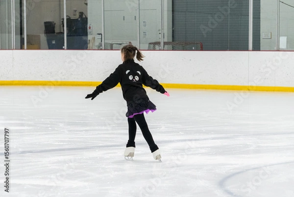 Obraz Figure skating practice at an indoor skating rink