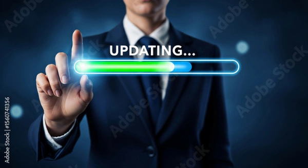 Fototapeta Business person touching a progress bar indicating an update in progress