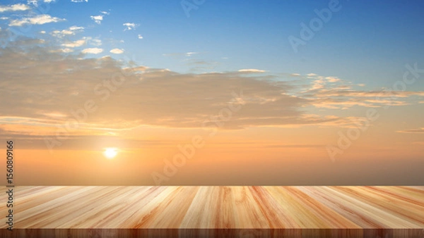 Obraz Top view of empty table as foreground with sunset and evening sky as background for displaying objects or showcasing products.