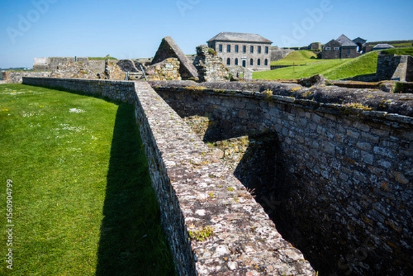 Obraz Kinsale, Ireland, May 20, 2024: Charles Fort British Fortress Ruins on Kinsale Bay with Rock Walls and Ramparts making up the castle and the Bay Defence 