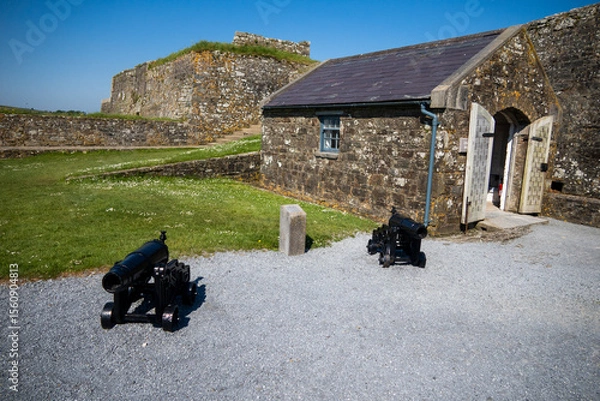 Obraz Kinsale, Ireland, May 20, 2024: Charles Fort British Fortress Ruins on Kinsale Bay with Rock Walls and Ramparts making up the castle and the Bay Defence 