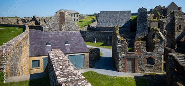 Obraz Kinsale, Ireland, May 20, 2024: Charles Fort British Fortress Ruins on Kinsale Bay with Rock Walls and Ramparts making up the castle and the Bay Defence 
